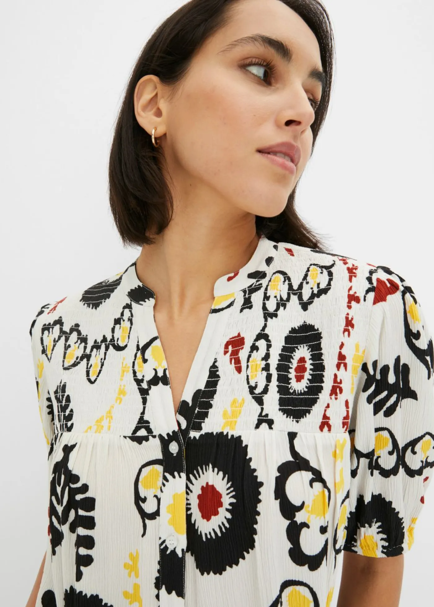 bonprix bonprix Blusa de manga corta de viscosa fluida con detalle de nido de abeja Blanco lana Sale