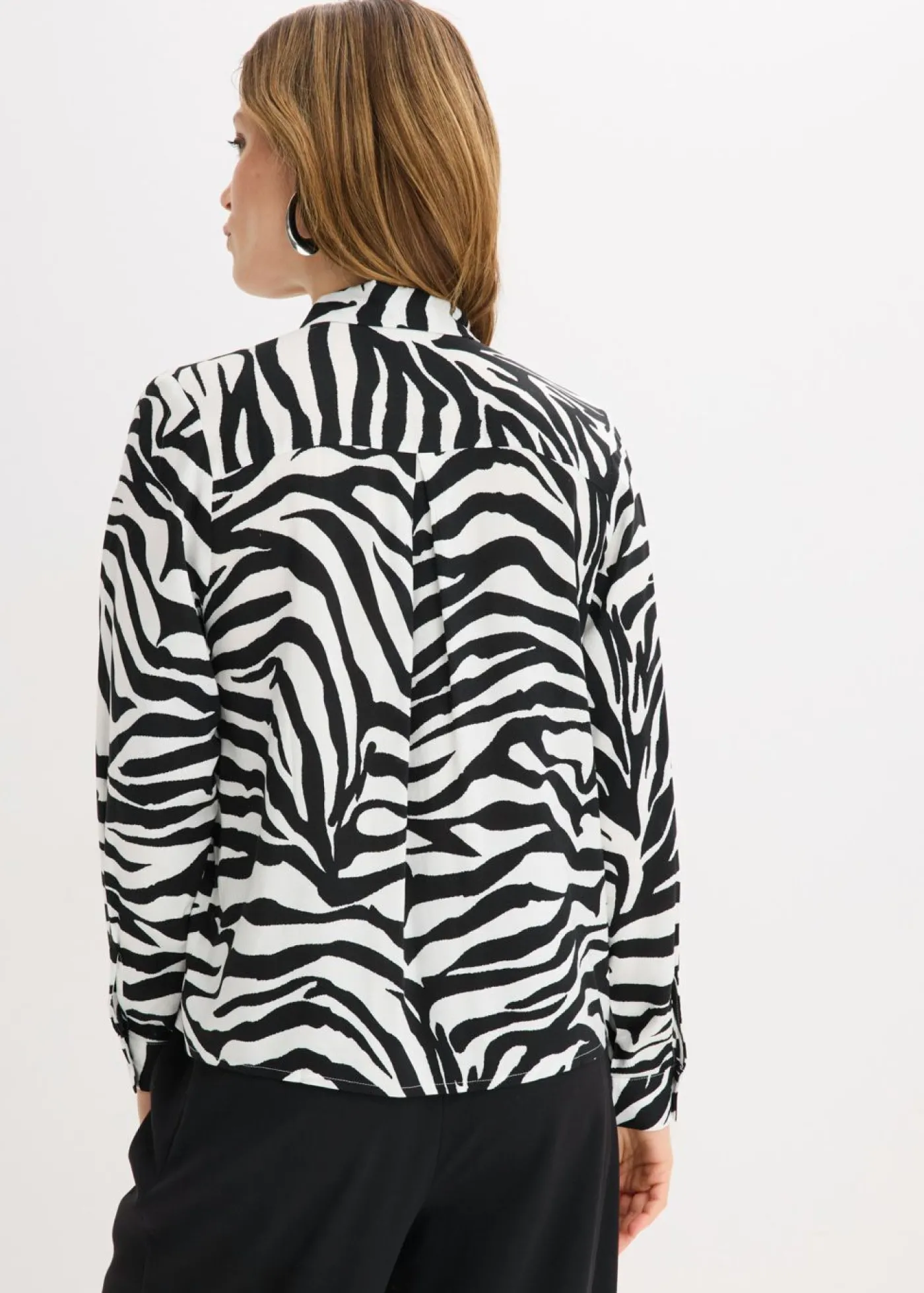 bonprix bonprix Blusa de viscosa fluida estampado cebra negro-blanco. Sale
