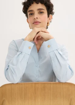 bonprix bonprix Blusa elástica de popelín con cuello chimenea y ligera transparencia azul pálido Best