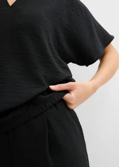 bonprix bonprix Blusa holgada con dobladillo elástico Negro Clearance
