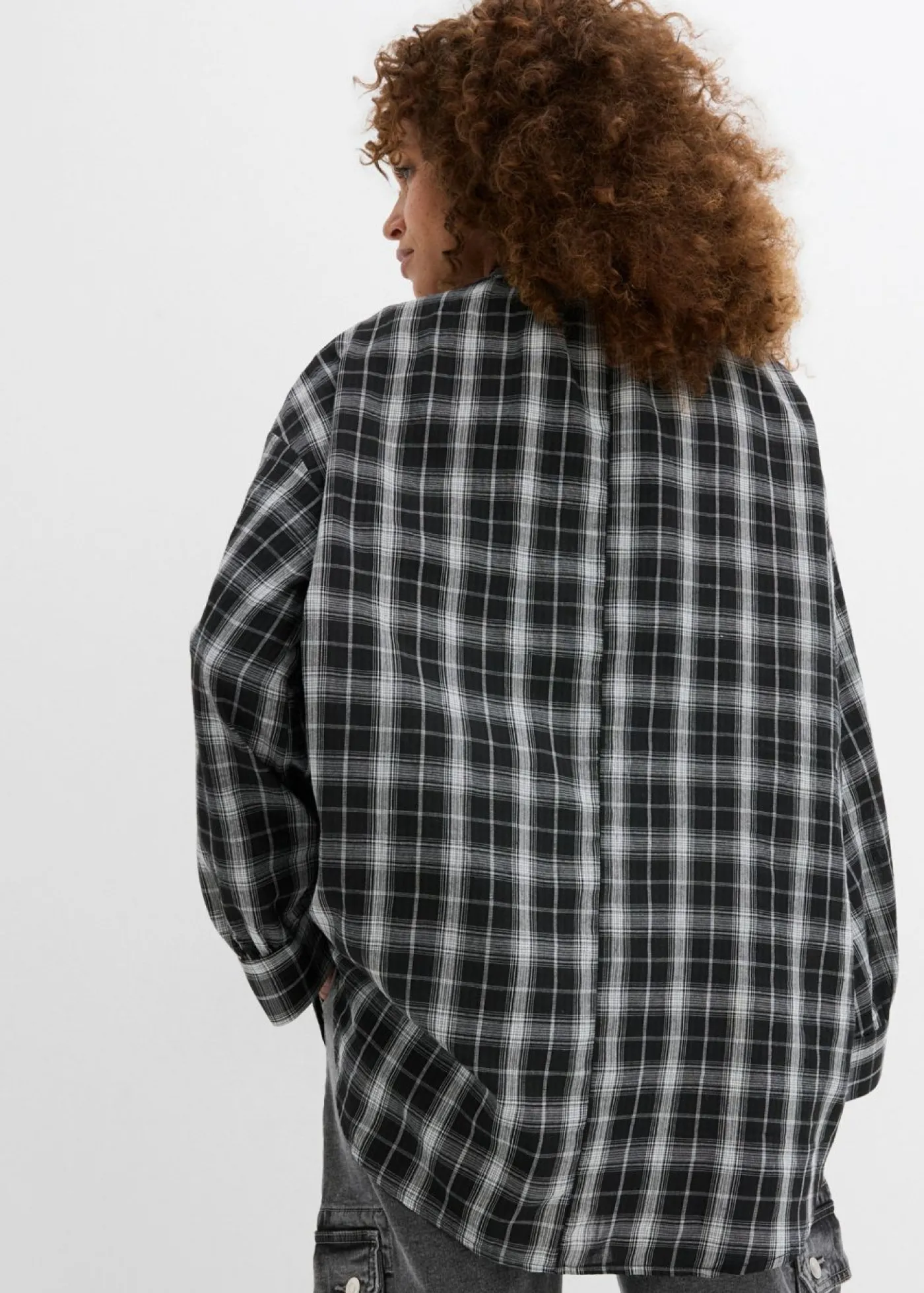 bonprix bonprix Blusa larga con corte holgado Negro-blanco a cuadros Online