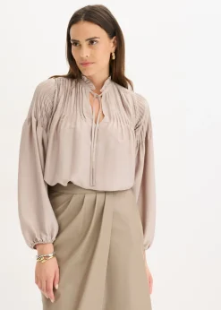 bonprix bonprix Blusa tipo túnica de satén brillante con ribetes Piedra Discount
