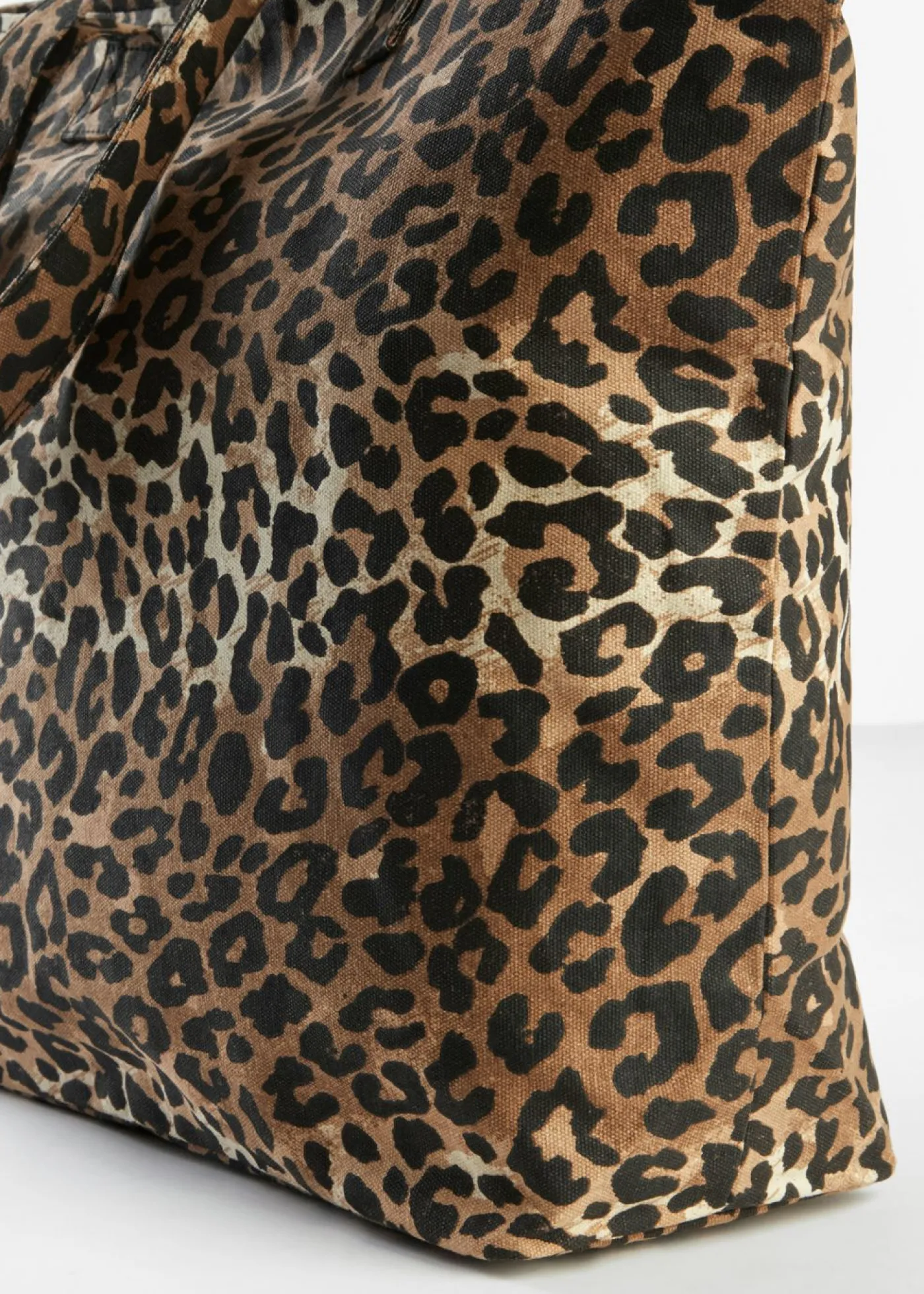bonprix bonprix Bolso tipo shopper de lona con estampado de leopardo estampado leo negro/beige Outlet