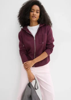 bonprix bonprix Chaqueta de chándal con capucha y poliéster reciclado rojo burdeos Hot