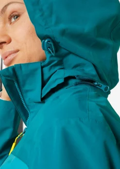 bonprix bonprix Chaqueta funcional impermeable con capucha turquesa Online