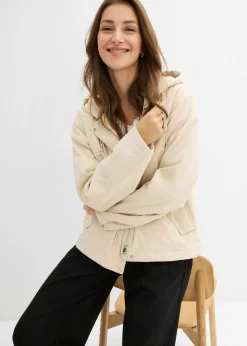 bonprix bonprix Chaqueta funcional ligeramente acolchada de material repelente al agua Arena claro Hot