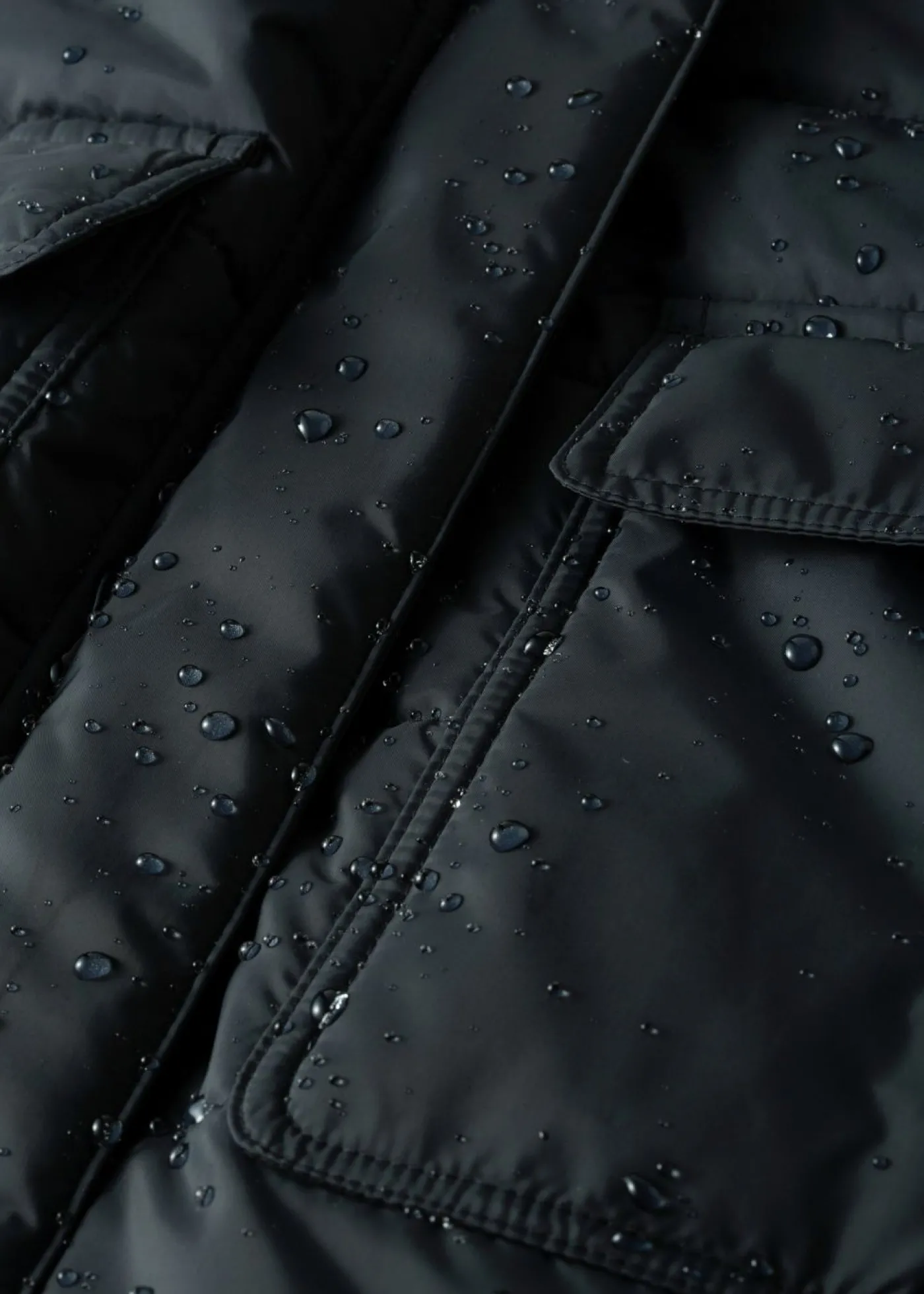 bonprix bonprix Chaqueta guateada larga funcional con aspecto 2 en 1, impermeable Negro Outlet