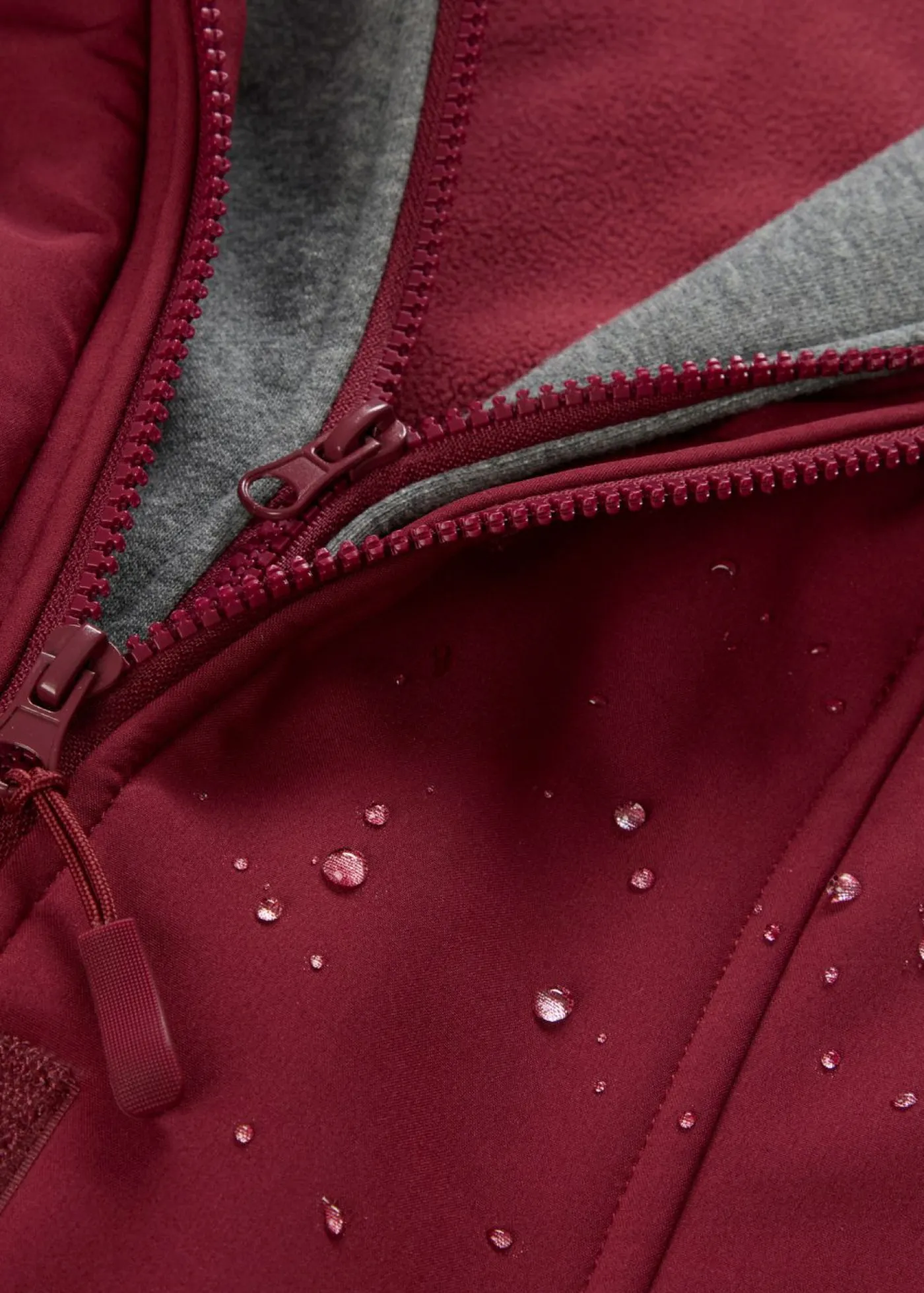 bonprix bonprix Chaqueta larga de softshell, repelente al agua, aspecto 2 en 1 Burdeos New