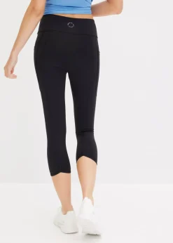 bonprix bonprix Cómodos leggings deportivos capri con bolsillo para móvil y material de secado rápido Negro Discount
