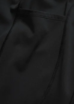 bonprix bonprix Cómodos leggings deportivos con bolsillo para móvil, corte acampanado y material de secado rápido Negro Clearance