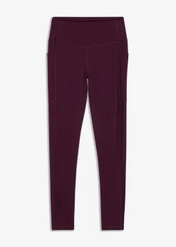 bonprix bonprix Cómodos leggings deportivos con bolsillo para móvil y material de secado rápido morado intenso New