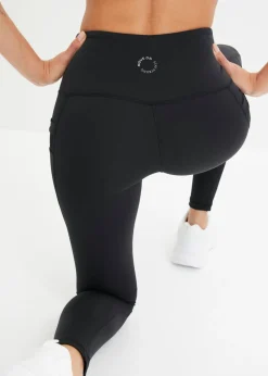 bonprix bonprix Cómodos leggings deportivos con malla y bolsillo para móvil Negro Online