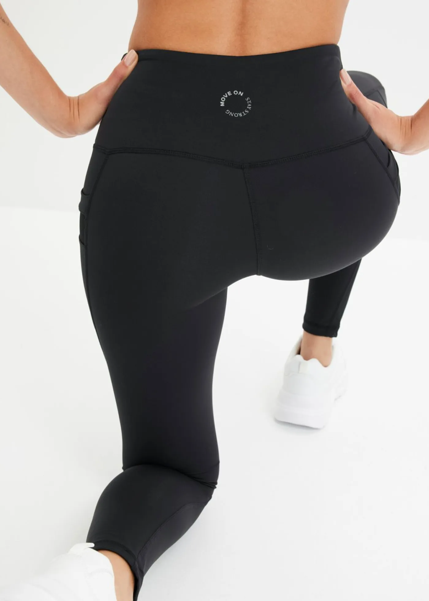 bonprix bonprix Cómodos leggings deportivos con malla y bolsillo para móvil Negro Online