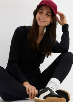 bonprix bonprix Conjunto de camiseta cruzada premamá con cómodos leggings (2 piezas) Negro Hot