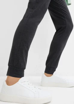 bonprix bonprix Pantalón de chándal con puños negro amarillo neón moteado