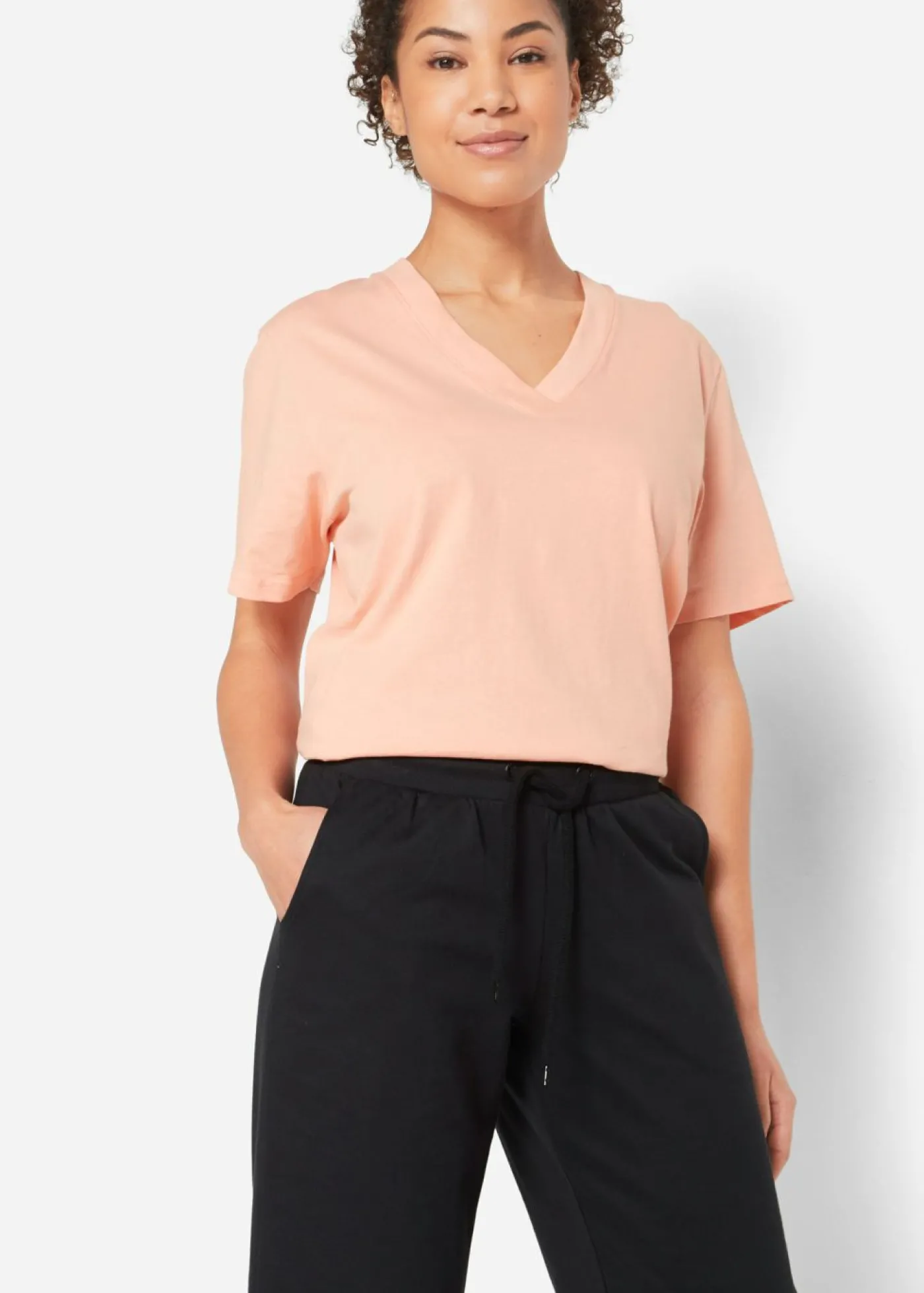bonprix bonprix Pantalón de chándal de algodón orgánico hasta la pantorrilla Negro Hot