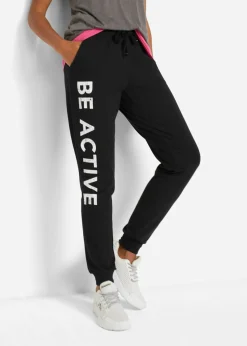 bonprix bonprix Pantalón de chándal de algodón con estampado y corte holgado Negro-blanco estampado Online