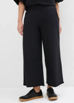 bonprix bonprix Pantalón de chándal de algodón orgánico con largo capri Negro Best