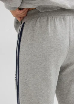 bonprix bonprix Pantalón de chándal de mezcla de algodón suave Gris claro jaspeado/azul marino estampado