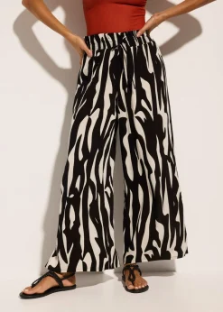 bonprix bonprix Pantalón de playa de viscosa fluida Caqui/negro con estampado gráfico Online