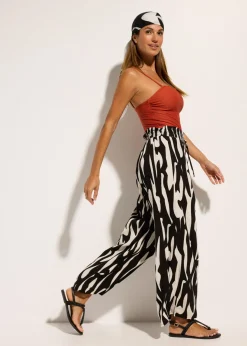 bonprix bonprix Pantalón de playa de viscosa fluida Negro-beige New