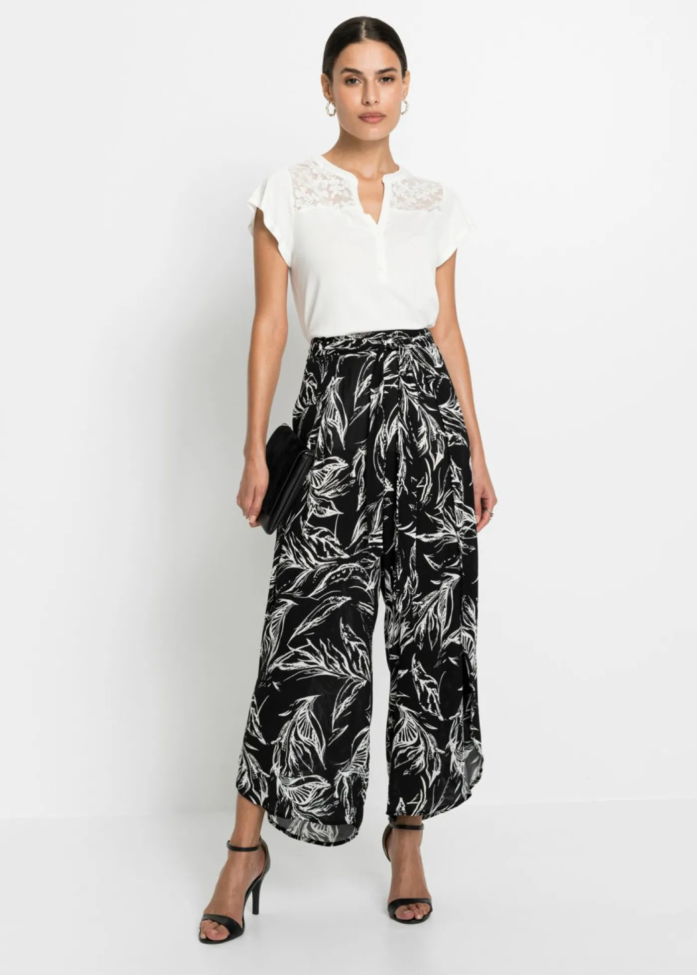 bonprix bonprix Pantalón de viscosa estructurada Negro-blanco de flores Hot