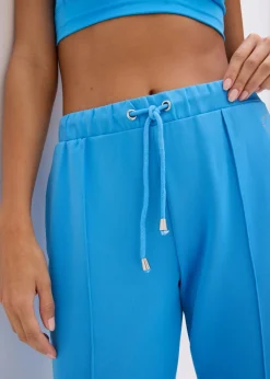 bonprix bonprix Pantalón deportivo con costuras decorativas azul brillante Outlet