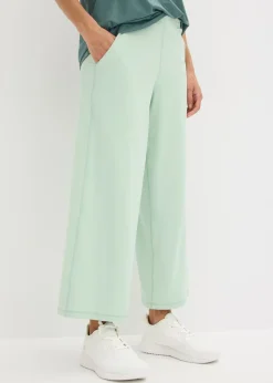 bonprix bonprix Pantalón deportivo con pernera ancha y material de secado rápido Verde pastel Best