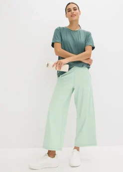 bonprix bonprix Pantalón deportivo con pernera ancha y material de secado rápido Verde pastel Best