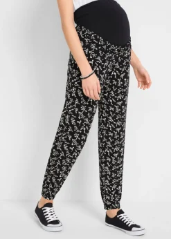 bonprix bonprix Pantalones premamá con estampado divertido, mezcla de viscosa, loose fit Negro de flores Sale