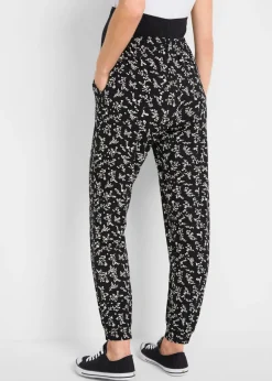 bonprix bonprix Pantalones premamá con estampado divertido, mezcla de viscosa, loose fit Negro de flores Sale