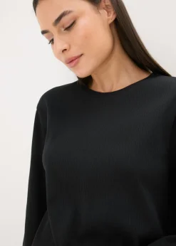 bonprix bonprix Pijama con camiseta de canalé y pantalón ancho estampado leo negro Hot