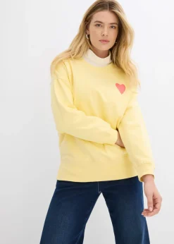 bonprix bonprix Sudadera holgada de algodón orgánico amarillo claro/salmón claro New