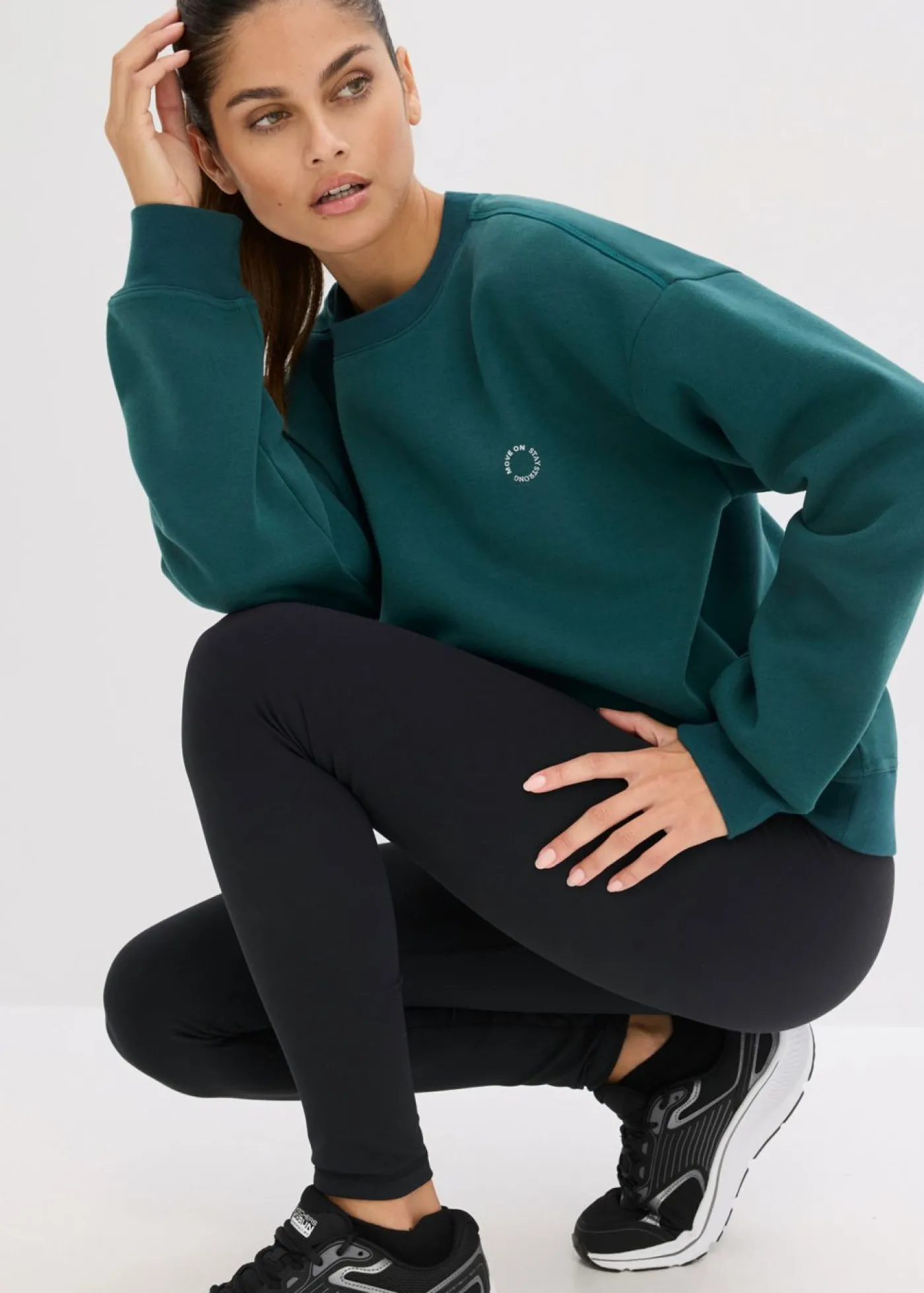 bonprix bonprix Sudadera térmica de material de secado rápido con corte holgado Verde petróleo
