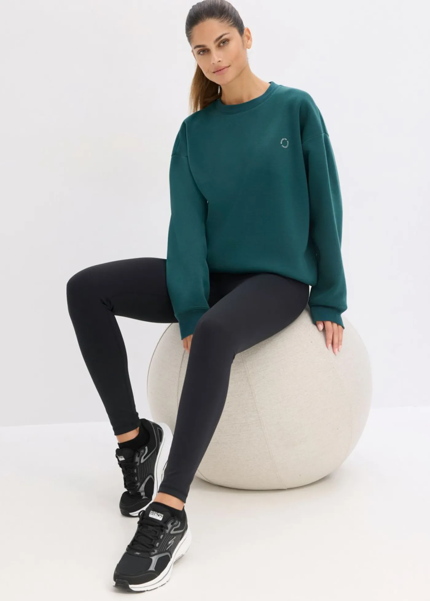 bonprix bonprix Sudadera térmica de material de secado rápido con corte holgado Verde petróleo