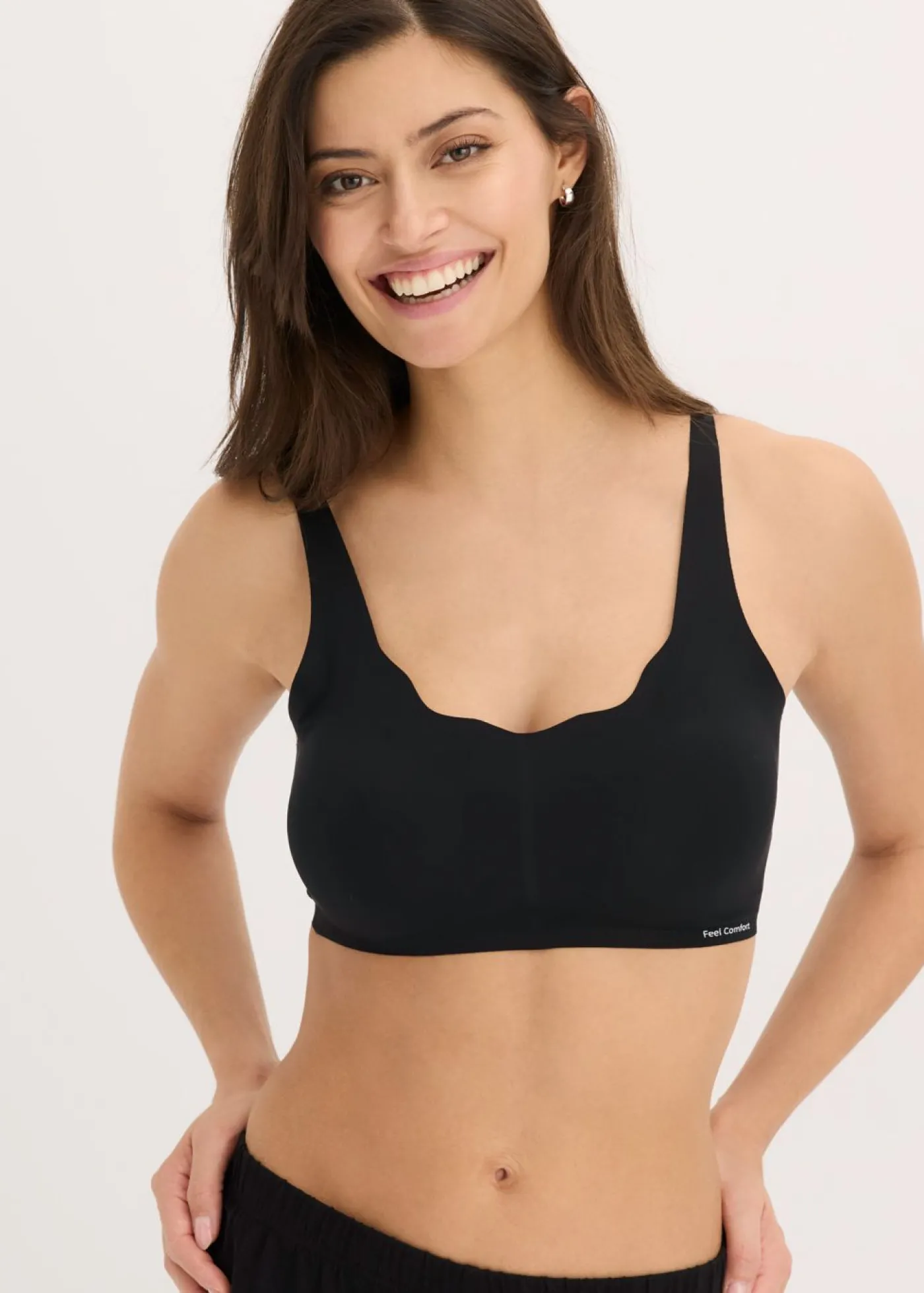 bonprix bonprix Sujetador básico Feel Comfort con corte láser sin aros Negro Hot