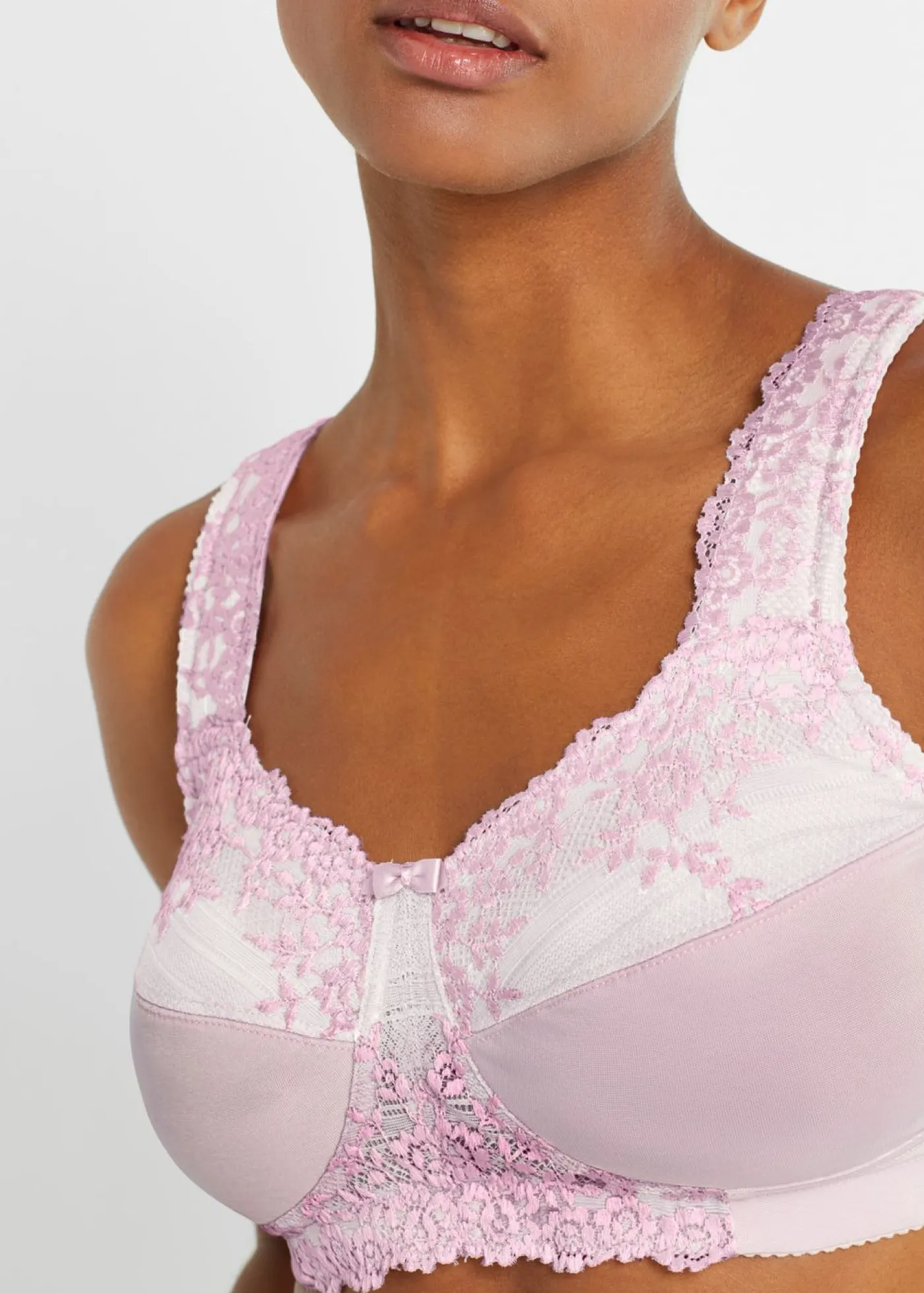 bonprix bonprix Sujetador reductor sin aros con tirantes acolchados Lila empolvado-blanco crema New