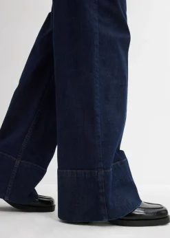 bonprix bonprix Vaqueros de talle medio de algodón orgánico con perneras anchas Azul oscuro denim Sale