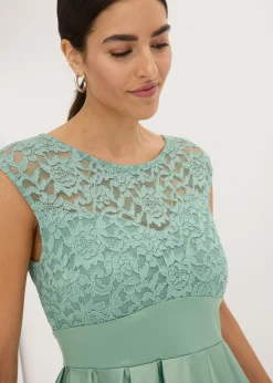 bonprix bonprix Vestido asimétrico de satén brillante con encaje Verde pastel Online