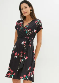bonprix bonprix Vestido de punto de diseño cruzado negro-frambuesa con flores Hot