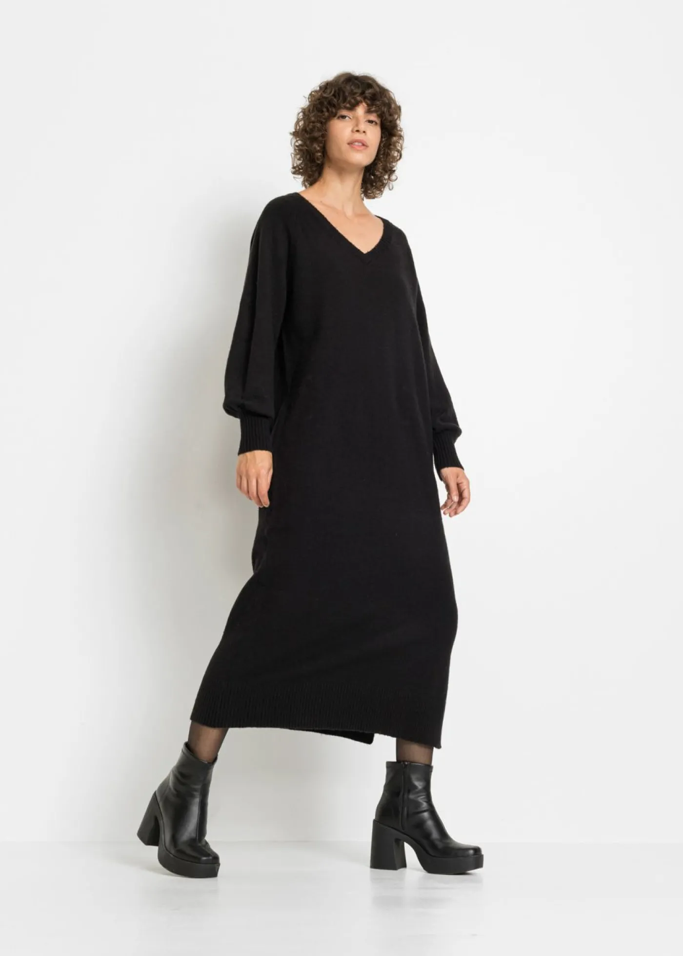 bonprix bonprix Vestido holgado de punto con largo midi Negro Online