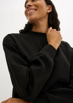 bonprix bonprix Vestido oversize tipo sudadera Negro Hot